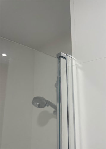 Mampara de bañera 2 hojas transparente Essential perfil cromado 115x140 cm